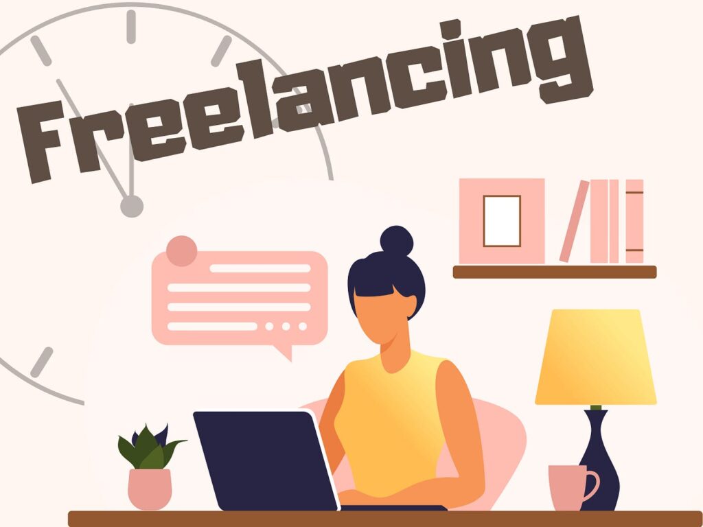 Focused freelancer typing on laptop a clear example of what is freelancing